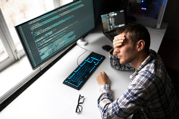 istock unhappy tired male manager feeling stress during work process 1390185739