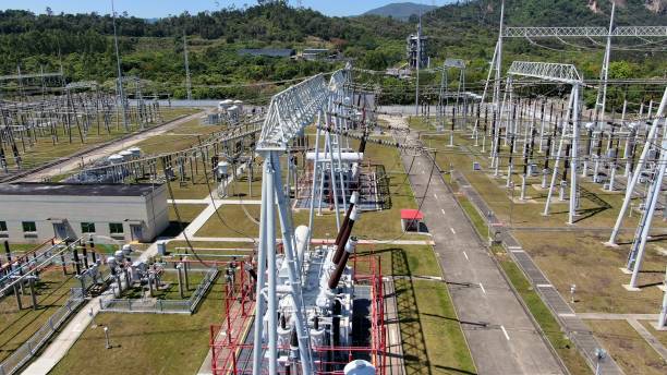 istock Power Transmission, High Voltage Transformer Field 1390198574