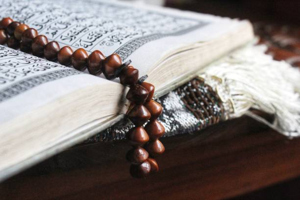 istock a prayer beads on the quran and prayer rug 1390200679