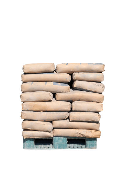 istock Cement powder bags stacked on pallet isolated on white background 1390200961