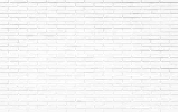 istock White grunge brick wall texture background for stone tile block painted in grey light color wallpaper modern interior and exterior and room backdrop design. Simple seamless pattern grid for backdrop. 1390201892