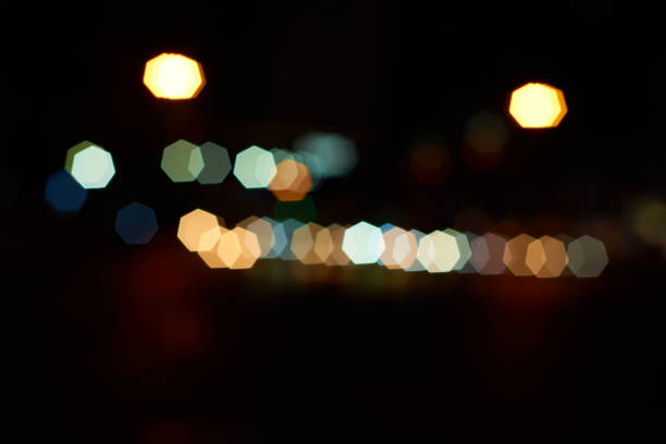 istock Dreamy light spots in the city at night 1390202222