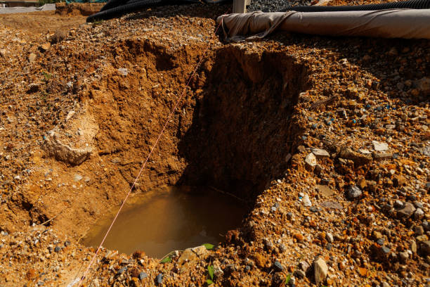 Hole dug for footings filled with water after rain