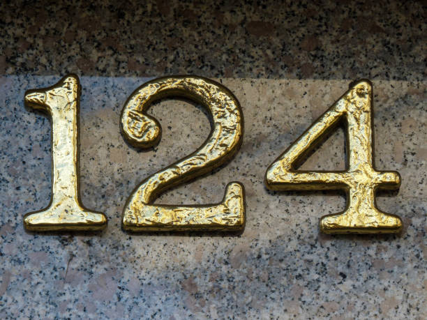istock Metal home number on a wall 1390210444
