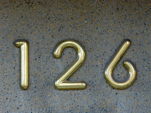 istock Metal home number on a wall 1390210481