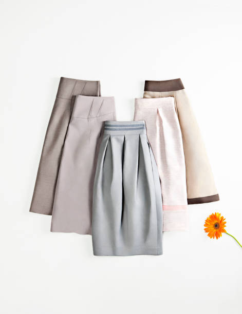 Fashionable skirts with single flower isolated on white background