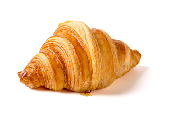 1 croissant isolato su fondo bianco. - croissant foto e immagini stock