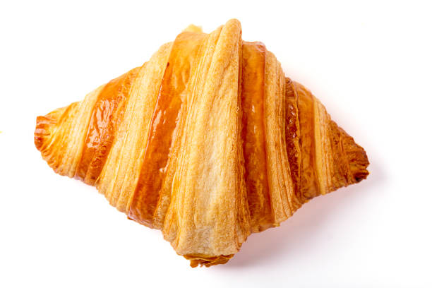 istock 1 croissants isolated on a white background. 1390211245