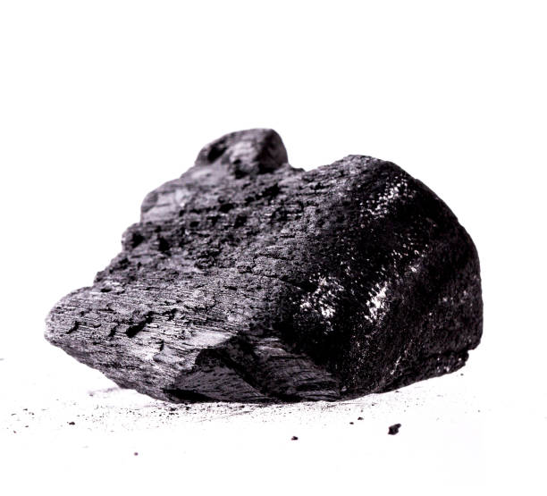 istock Natural wood charcoal Isolated on white background. 1390211410