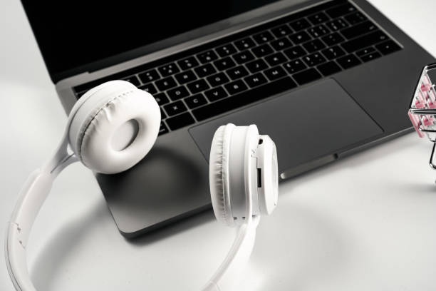 istock Headphones, laptops and shopping carts 1390211669