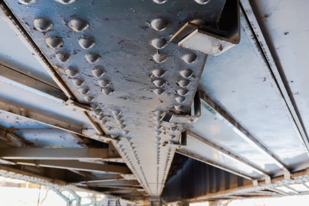 Metal structure under the old railway bridge, rivets, railway bridge