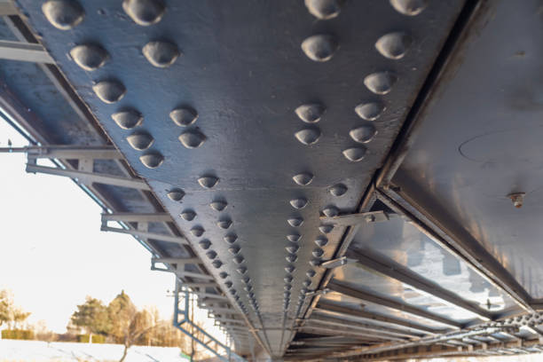 Metal structure under the old railway bridge, rivets, railway bridge