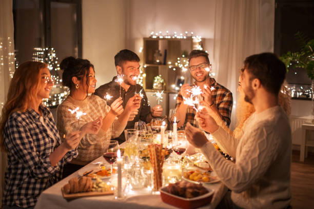 istock happy friends having christmas dinner at home 1390215280