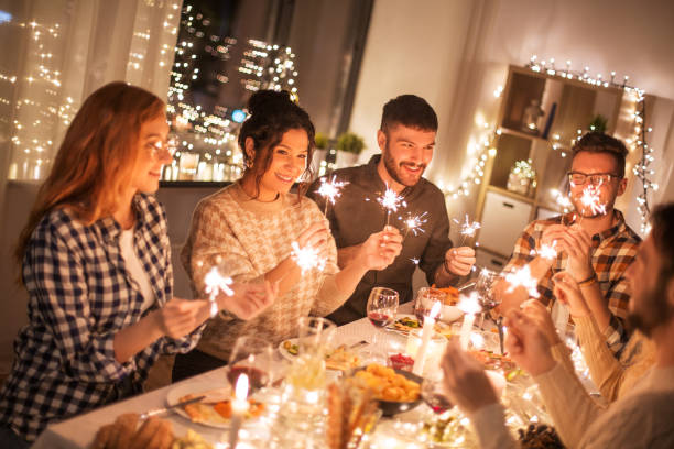 istock happy friends having christmas dinner at home 1390217982