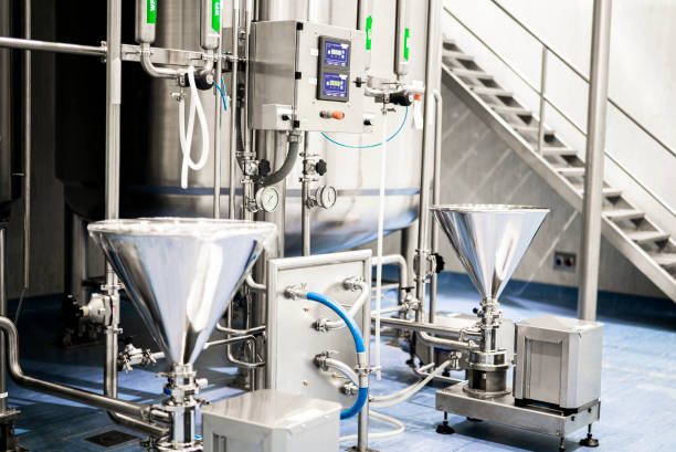 istock Tanks and funnels in a research facility 1390220376