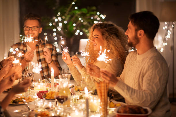 istock happy friends having christmas dinner at home 1390220401