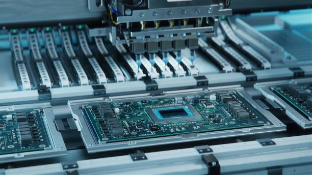 istock Shot of Generic Printed Circuit board with Microchips and other Components During Production Process. Electronics Manufacturing. Bright Environment 1390220549
