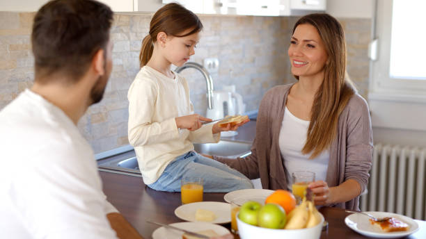 istock Nice breakfast for a happy family 1390226381