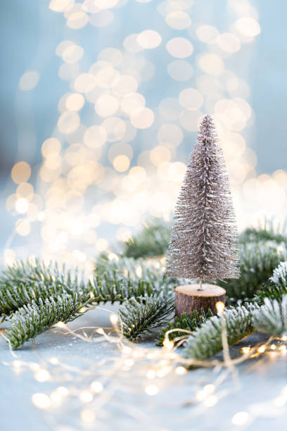 istock Christmas spruce with tree and blurred shiny lights. 1390233665