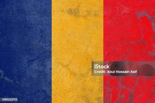 Rustic Painted Romania Flag On An Old Abandoned Concrete Wall Stock Photo - Download Image Now