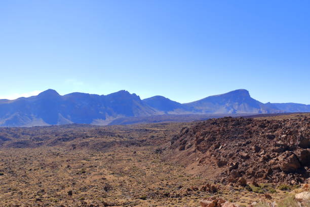 istock Teide National Park on Tenerife, with lava fields and the Teide volcano 1390233987