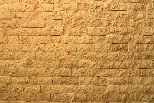 Repeating pattern of bricks in a wall
