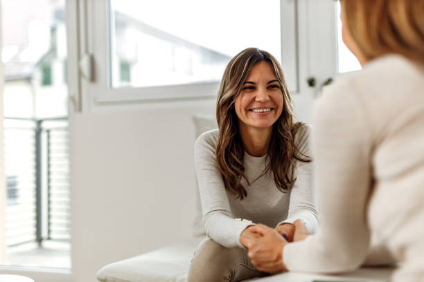 istock Woman helping patient to survive depression. 1390236506