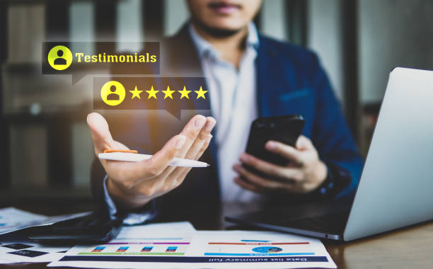 Concept of testimonial, business man on desk with display visual screen testimonial. Concept of testimonial, business man on desk with display visual screen testimonial. testimonial stock pictures, royalty-free photos & images