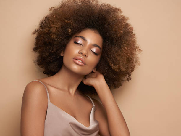 Beauty portrait of African American girl with afro hair stock photo