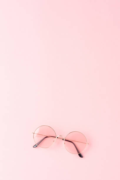 istock Women’s sunglasses on background. Top view 1390242281