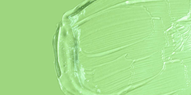 istock Background from textured cosmetic gel with bubbles.Top view,antibacterial liquid surface.Good as background or mockup,large banner. 1390244000