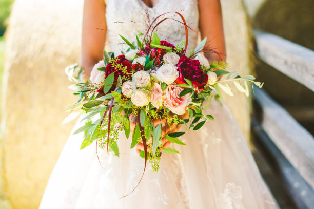 Bride and her wedding bouquet stock photo