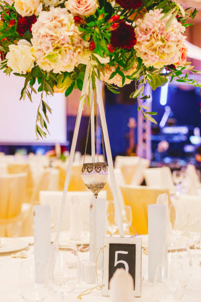 istock Guest table number. Wedding table in the restaurant. 1390245484