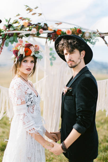 istock Bridegroom Holding Hand Looking Away During Wedding Ceremony 1390247381