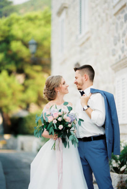 istock Portrait Of Bride Holding Bouquet 1390249417