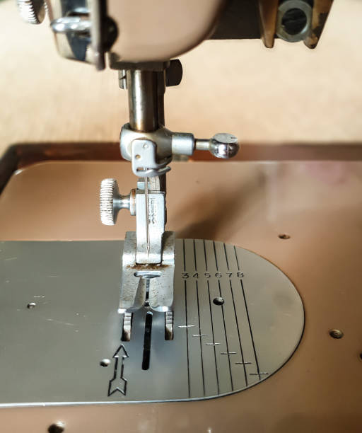 istock Vintage Singer sewing machine - brown 1390249506