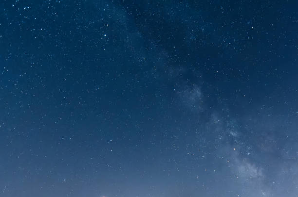 istock Night sky with the milky way and bright stars 1390251473