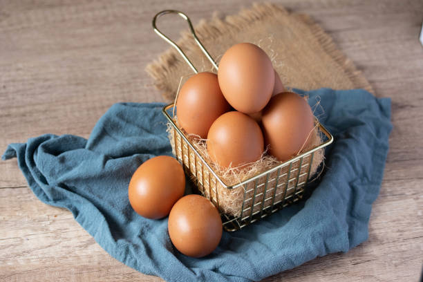istock fresh chicken eggs in a metal basket 1390251601