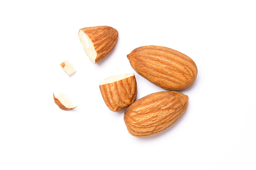 Almond nuts isolated on white background. Top view. Flat lay.Macro