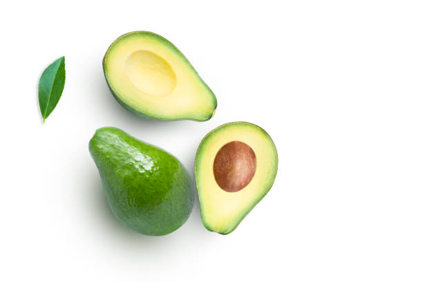 авокадо изолированы на белом - avocado стоковые фото и изображения