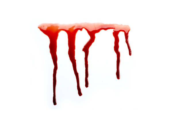 istock Drops of blood on white background. 1390259135