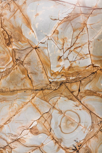 istock Tile of brown granite, abstract background. 1390259213