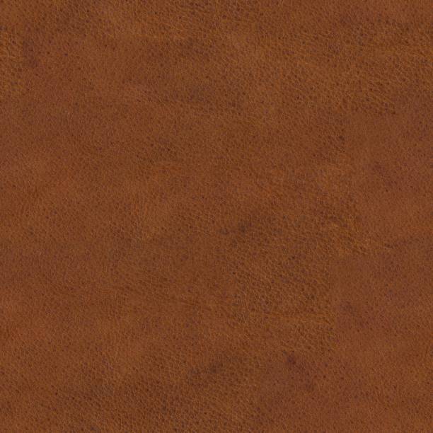 istock Texture of brown grunge leather. Seamless square background, tile ready. 1390259223