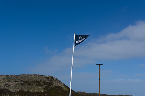 SYLT, GERMANY -MARCH  13, 2020:\nSylt, Germany -March 13, 2020: \nAt the Beach bar Sansibar, Kampen, Sylt, North Frisia, Schleswig-Holstein, Germany, Europe