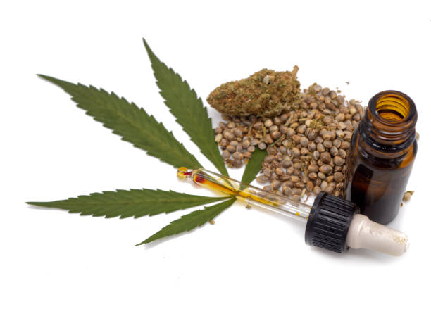 istock Cannabis leaf isolated with CBD OIL 1390261890