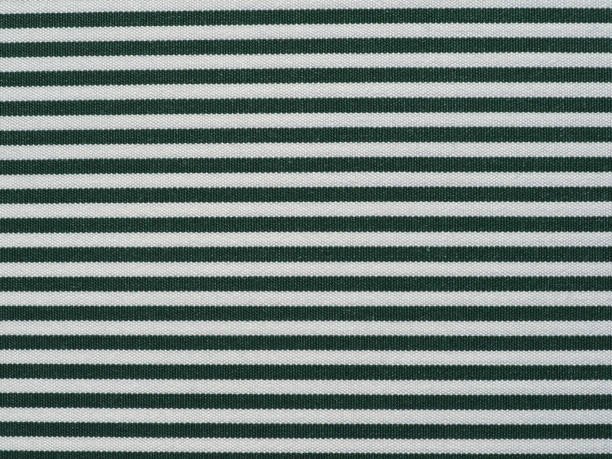 istock striped dark green and white cotton fabric texture background 1390262373