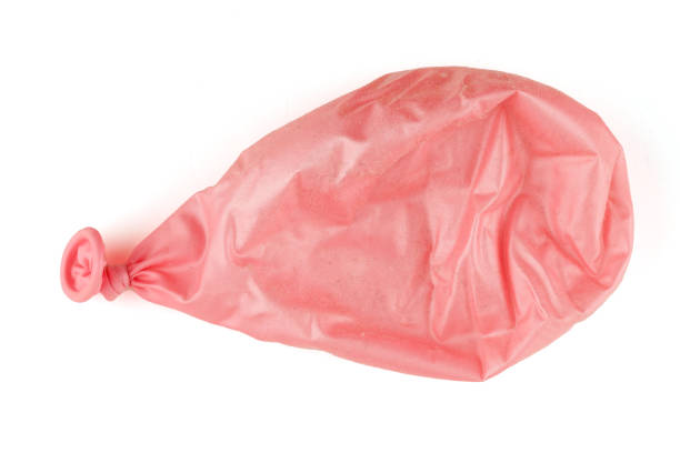istock Pink inflated ball with wrinkles 1390263659