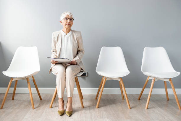 istock Stressful woman waiting for job interview 1390265301