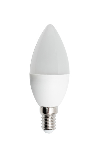 Small Candle Edison Screw E14 Base Light Bulb isolated on white background. New technology electric LED light bulb with copy space. White matte plastic an energy-saving diode light bulb.