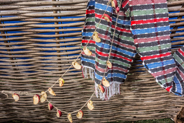 istock Apple slices and handmade rugs are dried on a rustic hedge 1390266957